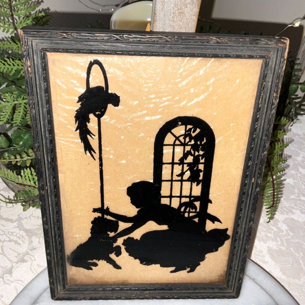 Vintage Reverse Painted Silhouette on Glass titled Playmates terrier, parrot